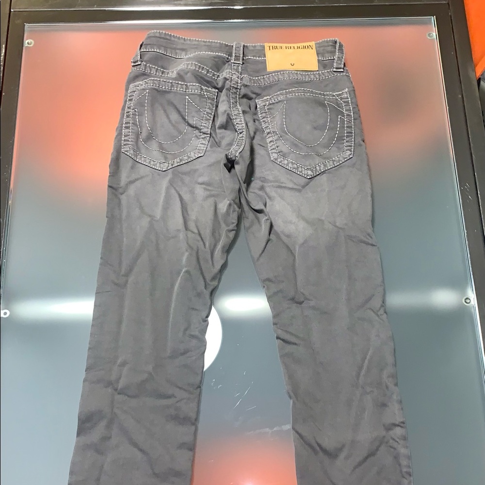 Men’s True Religion jeans.